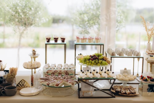 Preview: Dessert table offering various sweets and fresh fruits