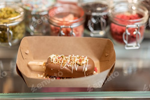 Preview: Chocolate ice cream on a cardboard