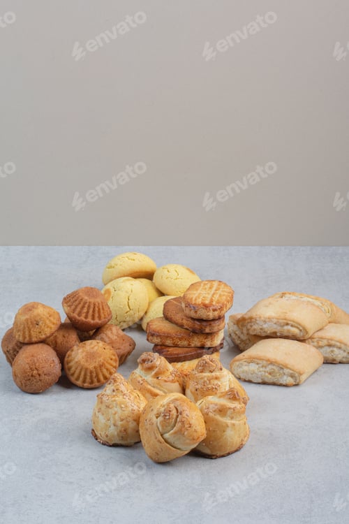 Preview: Bunch of homemade biscuits on gray table