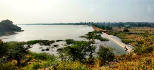 Preview: Bird's eye panoramic view of Kali dam, check dam on a sunny day in Dahod, Gujarat, India