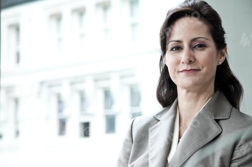 Confident Woman Posing in Business Setting