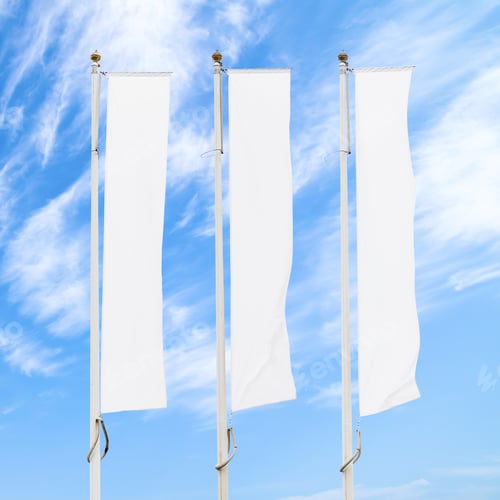 Preview: Three blank white corporate flags on flagpoles against cloudy blue sky