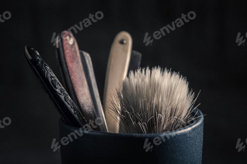 Preview: Old tools for barber. Sharp razor, soap and brush