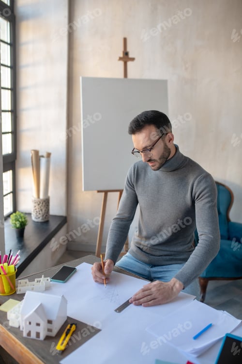 Preview: Interior designer drawing sketches for important project