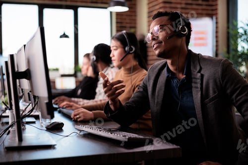 Preview: Reception secretary answering client phone call at customer service