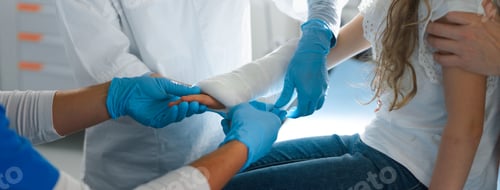 Preview: Close-up of doctor giving gypsum to little girl.