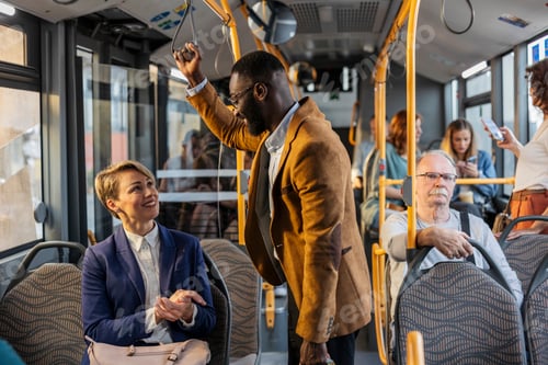 Preview: Diverse passengers commuting by public transport talking in a bus