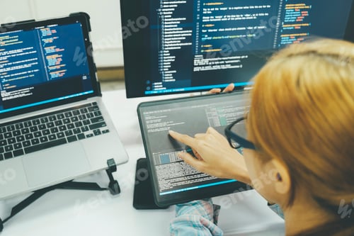 Preview: Close up programmer is coding and programming software.