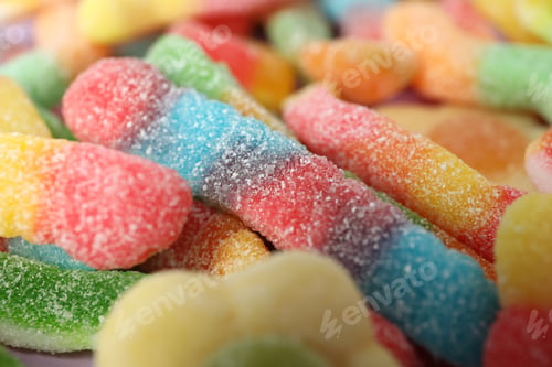Preview: Gummy candies all over background, close up