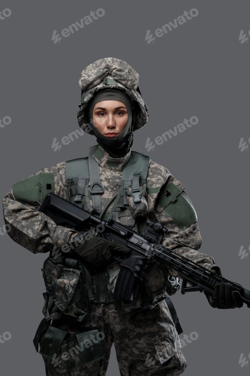 Preview: Female army soldier with rifle against grey background
