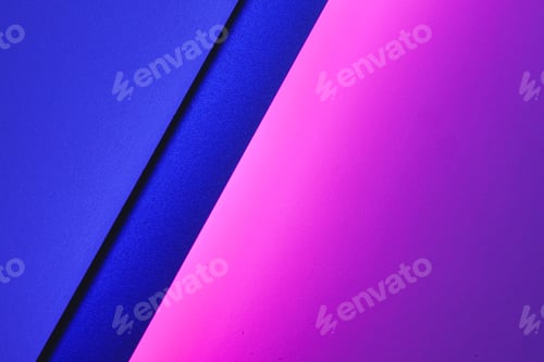 Preview: Blank paper sheets rolled in a neon purple lighting