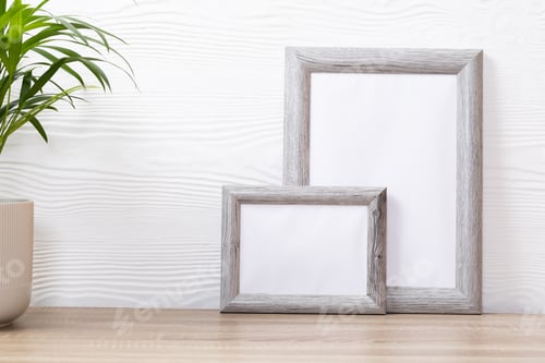 Preview: Composition of white cards in frames with copy space and plant on white background
