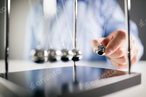 Preview: Newton's cradle businessman concept for cause and effect