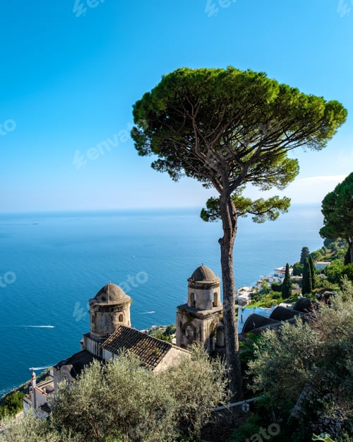 Preview: Breathtaking view from the Amalfi coast showcasing sea, green hills, and charming architecture