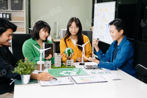 Preview: Asian professionals collaborate on sustainable energy solutions with wind turbines, solar panels,