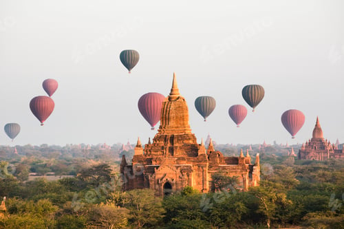 Preview: Hot air balloons glide over ancient temple at sunrise