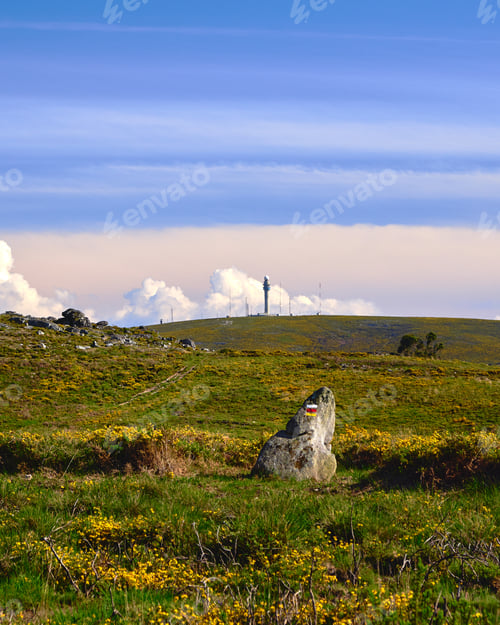 Preview: A road on top of a mountain near weather radar in Arouca Geopark, Portugal on a sunny day.