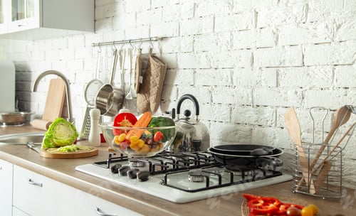 Preview: Modern stylish kitchen interior with vegetables and fruits on the table .