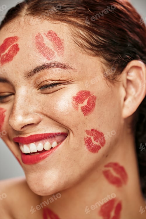 Preview: Happy woman, red lipstick and makeup on face of skin model in studio for cosmetics and love. Headsh