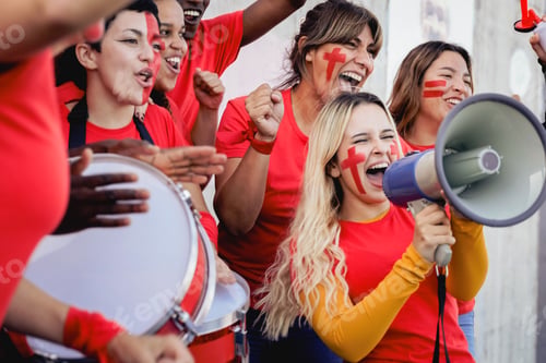 Preview: Crazy yellow sport football fans celebrate team victory in game at stadium