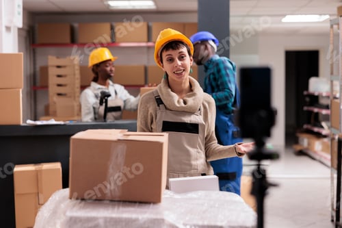Preview: Storehouse manager recording video for client with order packing