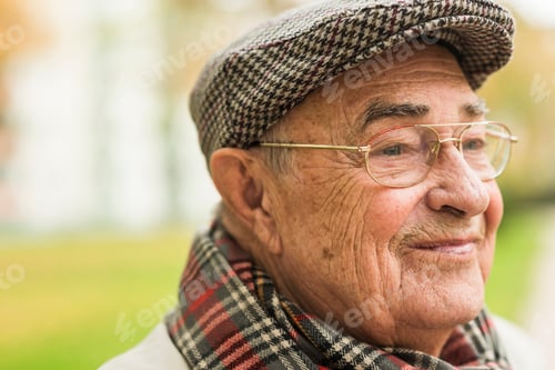 Preview: Smiling senior man outdoors