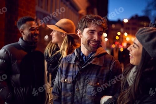 Preview: Group Of Friends In City Outdoors On Night Out Together