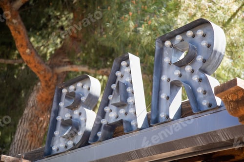 Preview: Industrial Marquee letters Bar Sign with Bulbs on Roof of Business.