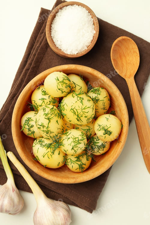 Preview: Concept of tasty food with boiled young potatoes, top view