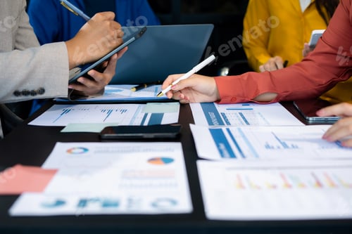Preview: Business team using a calculator to calculate the numbers of statistic business profits growth rate
