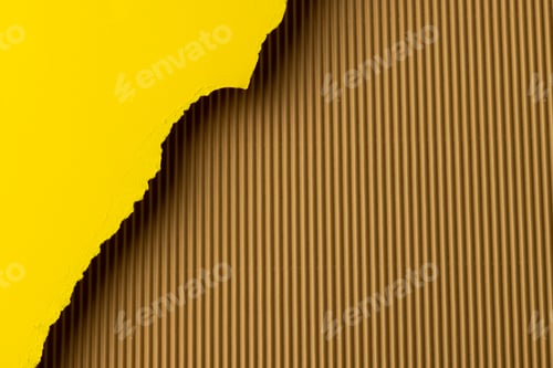 Preview: Ripped up pieces of yellow paper with copy space on cardboard background