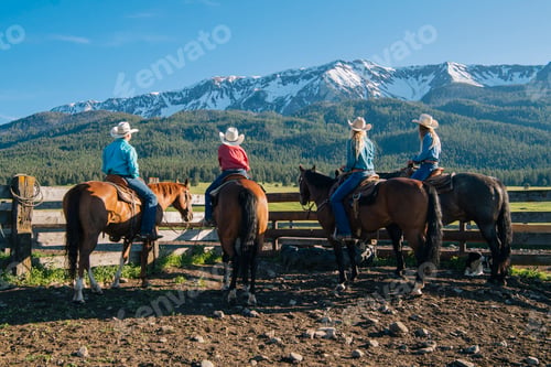 Preview: Rear view of cowboys and cowgirls on horseback, Enterprise, Oregon, United States, North America