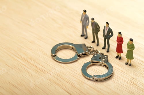 Preview: Businessmen in Row with Handcuffs: Corporate Dilemma and Legal Consequences