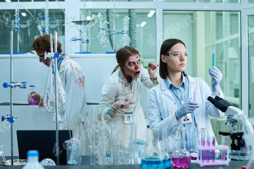 Preview: Serious Woman Working In Lab Full Of Zombies