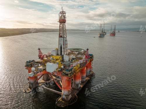 Preview: Oil Drilling and Decommissioning Rigs at Sunset