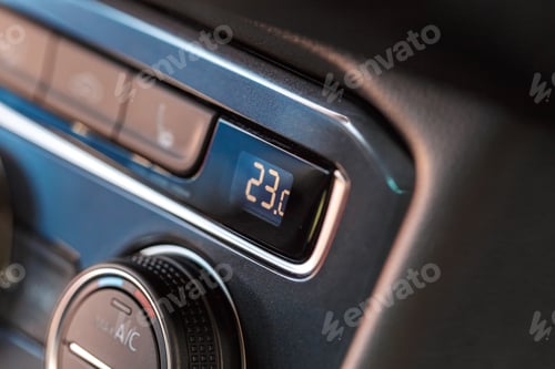Preview: Display shows temperature set at 23 degrees in car dashboard during drive