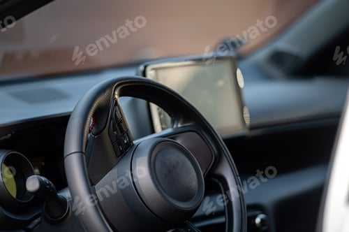 Preview: Interior view car with modern steering wheel, dashboard. Closeup. Shallow depth of field