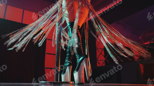 Preview: woman in high leather boots on platform heels with rhinestones.Fringe skirt with pendants