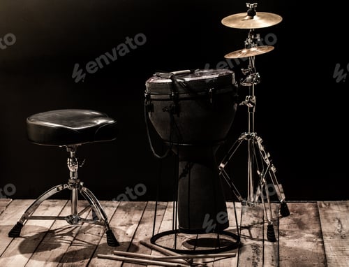 Preview: musical percussion instruments on black background