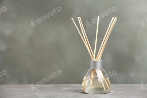 Preview: Aromatic reed freshener on table against grey background
