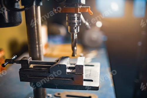 Preview: Drilling machine at the workplace in workshop