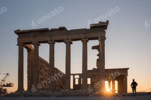 Preview: Tourist man sightseeing at the Acropolis at sunset on summer vacation, Athens, Attica Region, Greece
