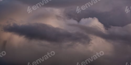 Preview: Dramatic Panoramic View of a cloudscape during a dark, rainy and colorful sunset