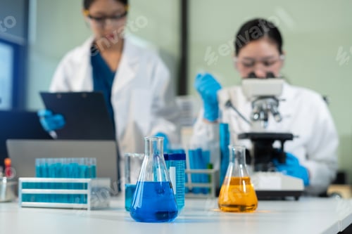 Preview: experiments containing chemical liquid in laboratory on glassware, innovative and technology.