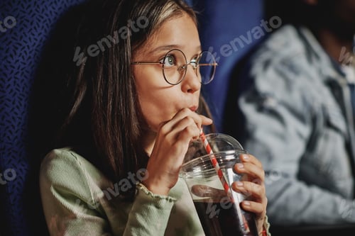 Preview: Girl Drinking Cola At Cinema
