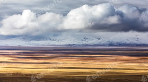Preview: Endless steppe and snow-capped mountains in Siberia. Altai. Russia