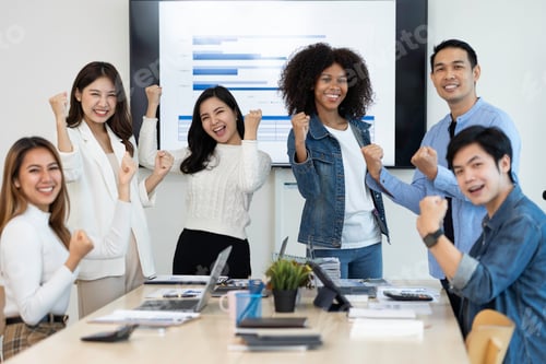 Preview: business team celebrates corporate victory together in the office, happy overjoyed professionals gro