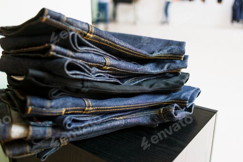 Preview: Stack of new jeans in factory
