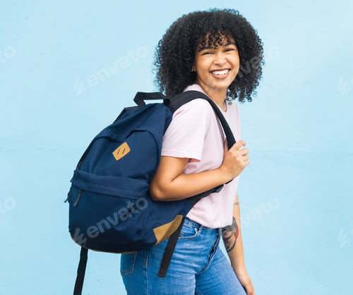 Preview: Portrait, student and black woman with backpack on blue background for studying. Happy face, girl a