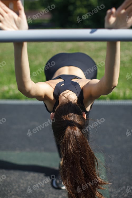 Preview: sporty female on outdoor fitness workout